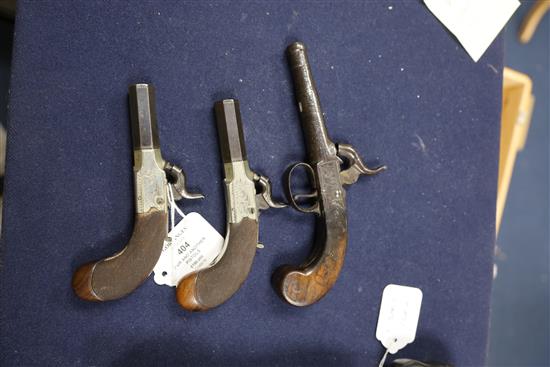 A pair of early 19th century Lacey & Co of London box lock muff pistols, 7.5in.